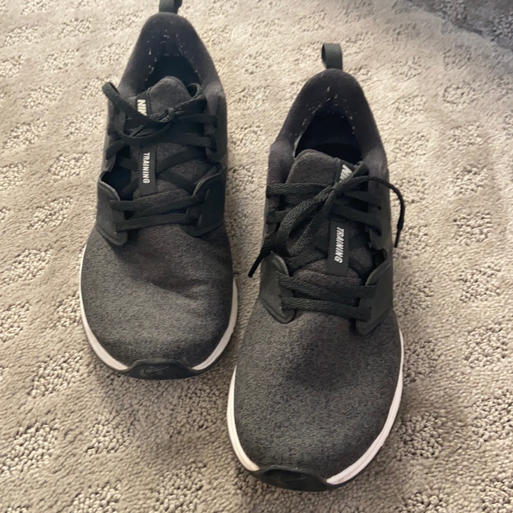 Black Nike training shoes.